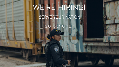 Female CBPO stands in front of train. Text reads We're Hiring! Serve your Nation. Go Beyond