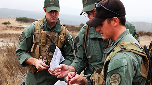 USBP officers speaking with one another about a possible mission