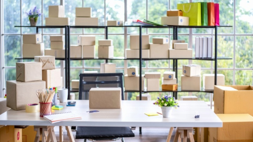 Boxes laid out on and around desk