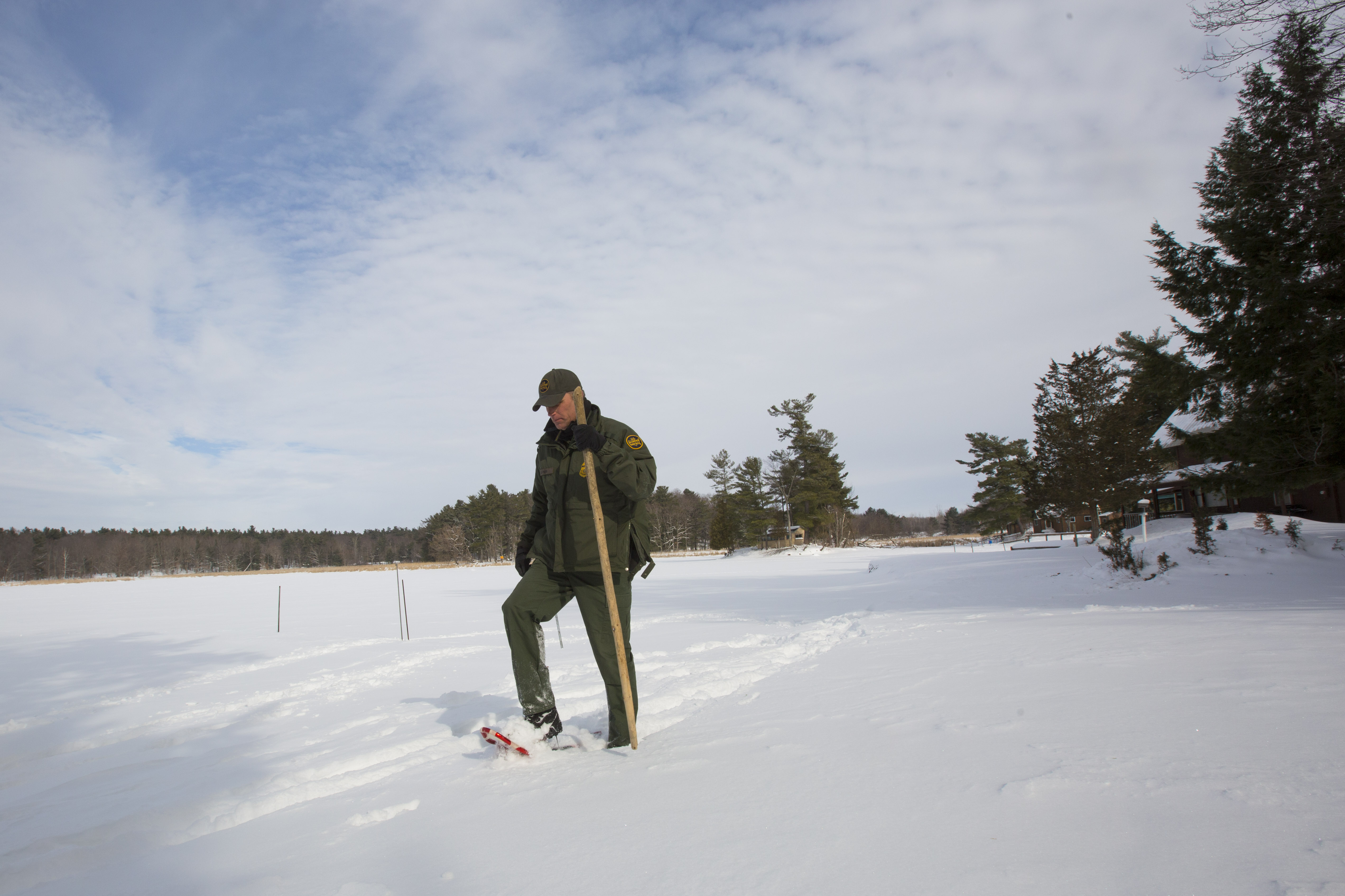 Photo of a Border Patrol agent on a remote patrol using snowshoes.