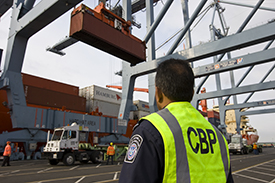 During the coronavirus pandemic, the U.S. borders have remained open for legitimate trade. A CBP officer at the busiest cargo seaport in the nation, Los Angeles-Long Beach in California, awaits a cargo container.