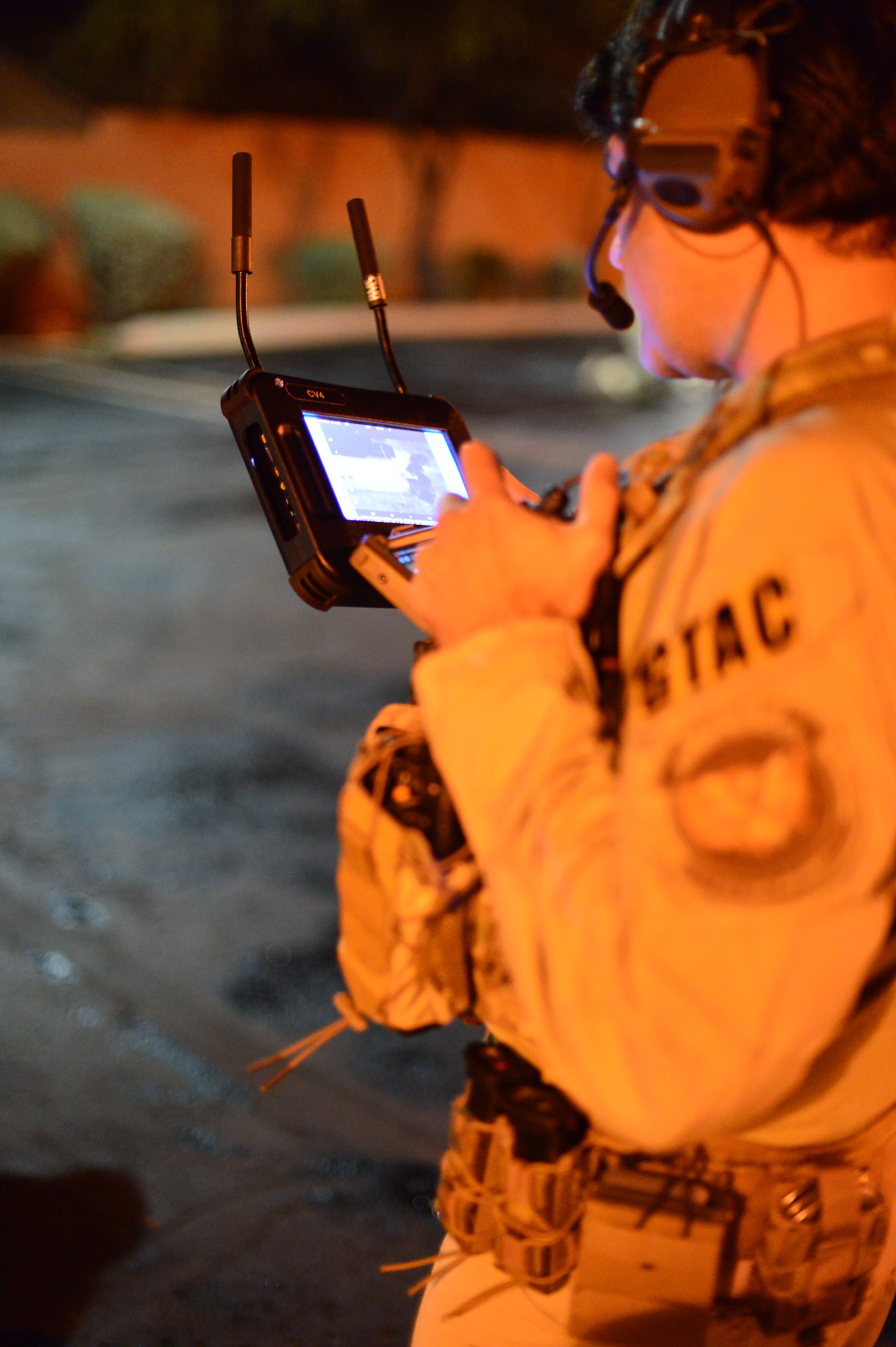 An AMO Ground Team Air Coordinator preparing for the execution of numerous search and arrest warrants in southern Arizona