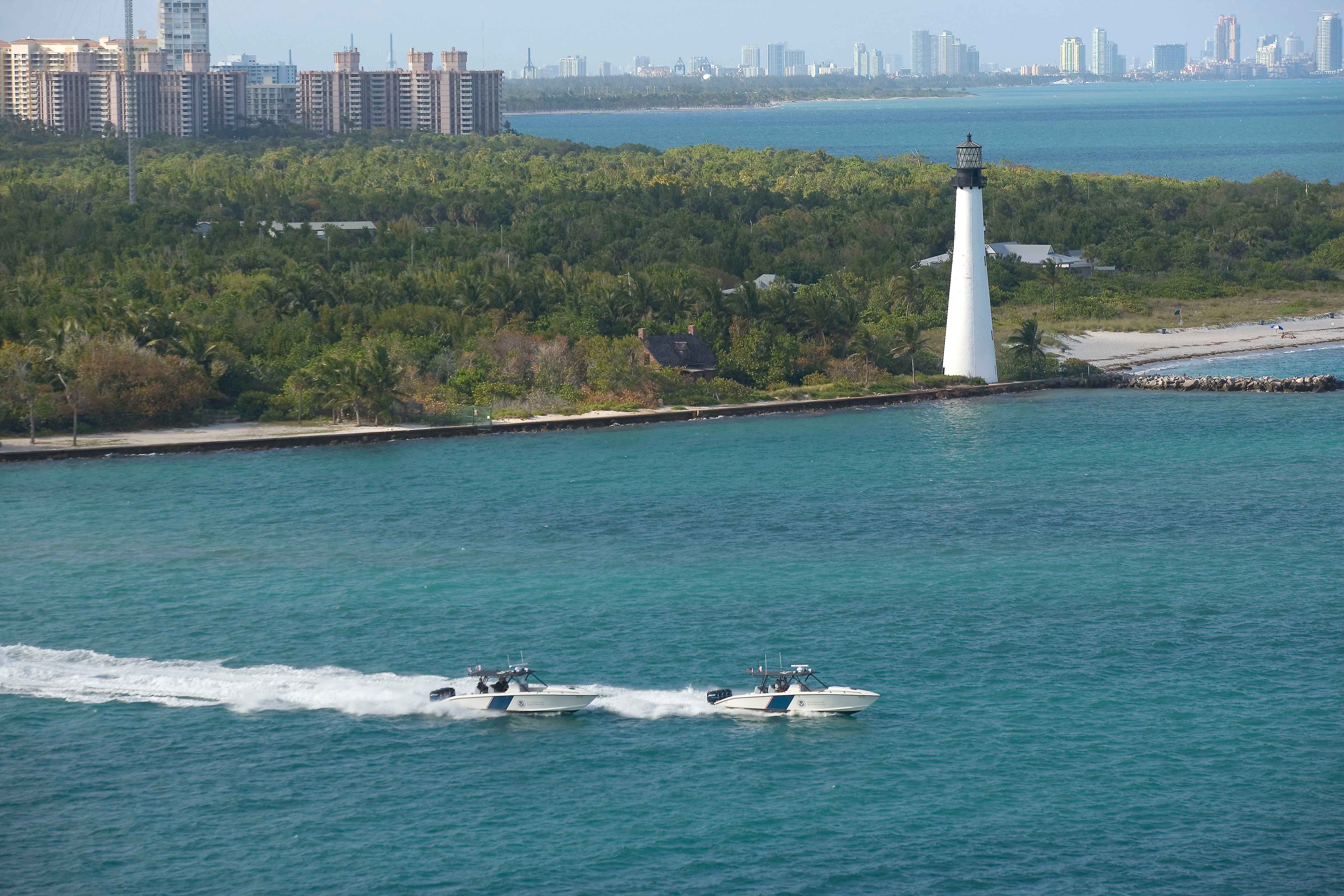 Two CBP Marine unit Midnight Express boats patrol the waters off of Florida's shores.