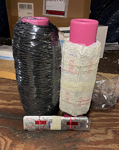 CBP officers seized nearly 70,000 Ambien pills at Washington Dulles International Airport on January 16, 2025, that were concealed inside 96 spools of black yarn shipped from India in December.