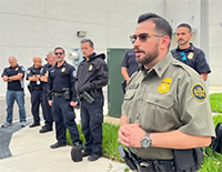 CBP Incident Commander Joe Gonzalez speaks to the CBP response team in preparation for Hurricane Milton.