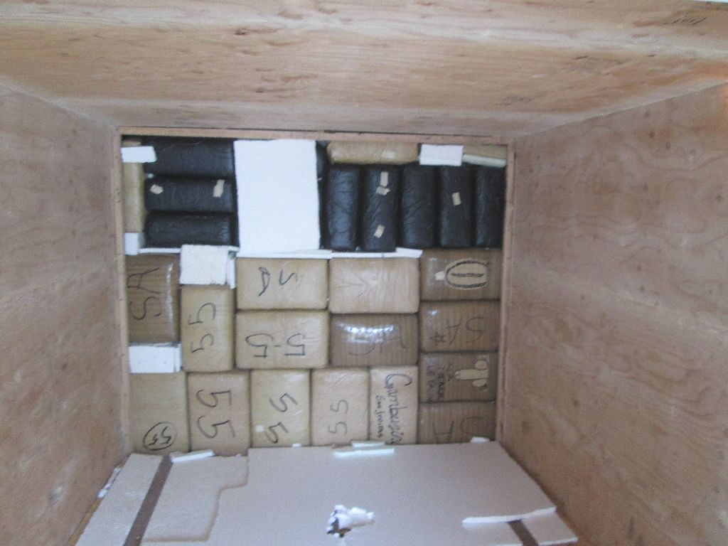 CBP officers assigned to the Port of Lukevilled searching a cargo truck, discover nealry 30 bundles of marijuana inside a hidden