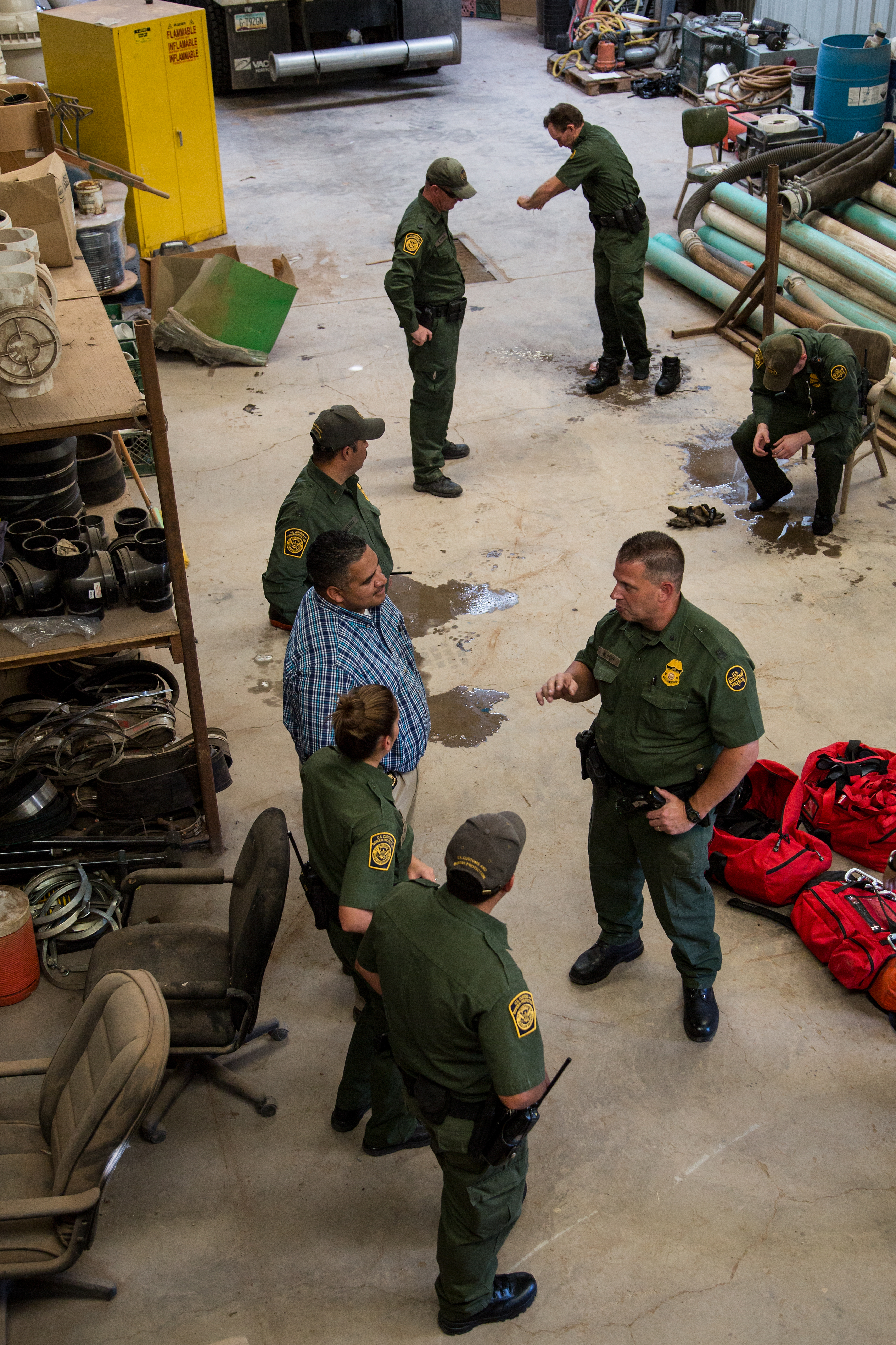 Border Patrol agents discuss what they saw after they exited the Douglas Tunnel