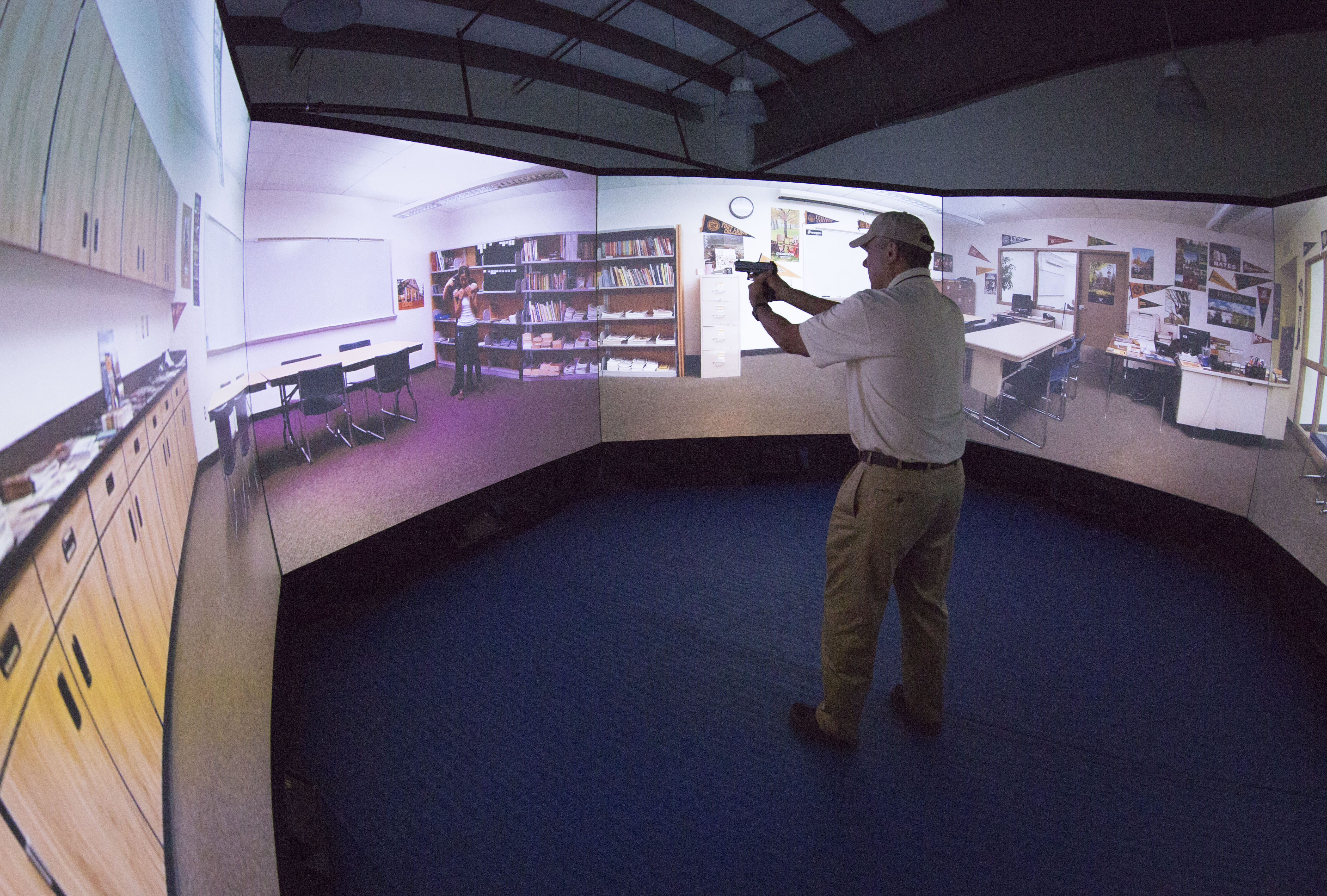 At CBP’s Advanced Training Center in Harpers Ferry, West Virginia, Commissioner Kerlikowske gives his best shot in the virtual training simulator in August.