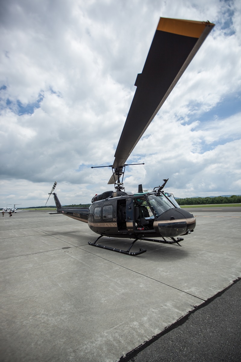 A CBP Bell Huey II readies for take-off.