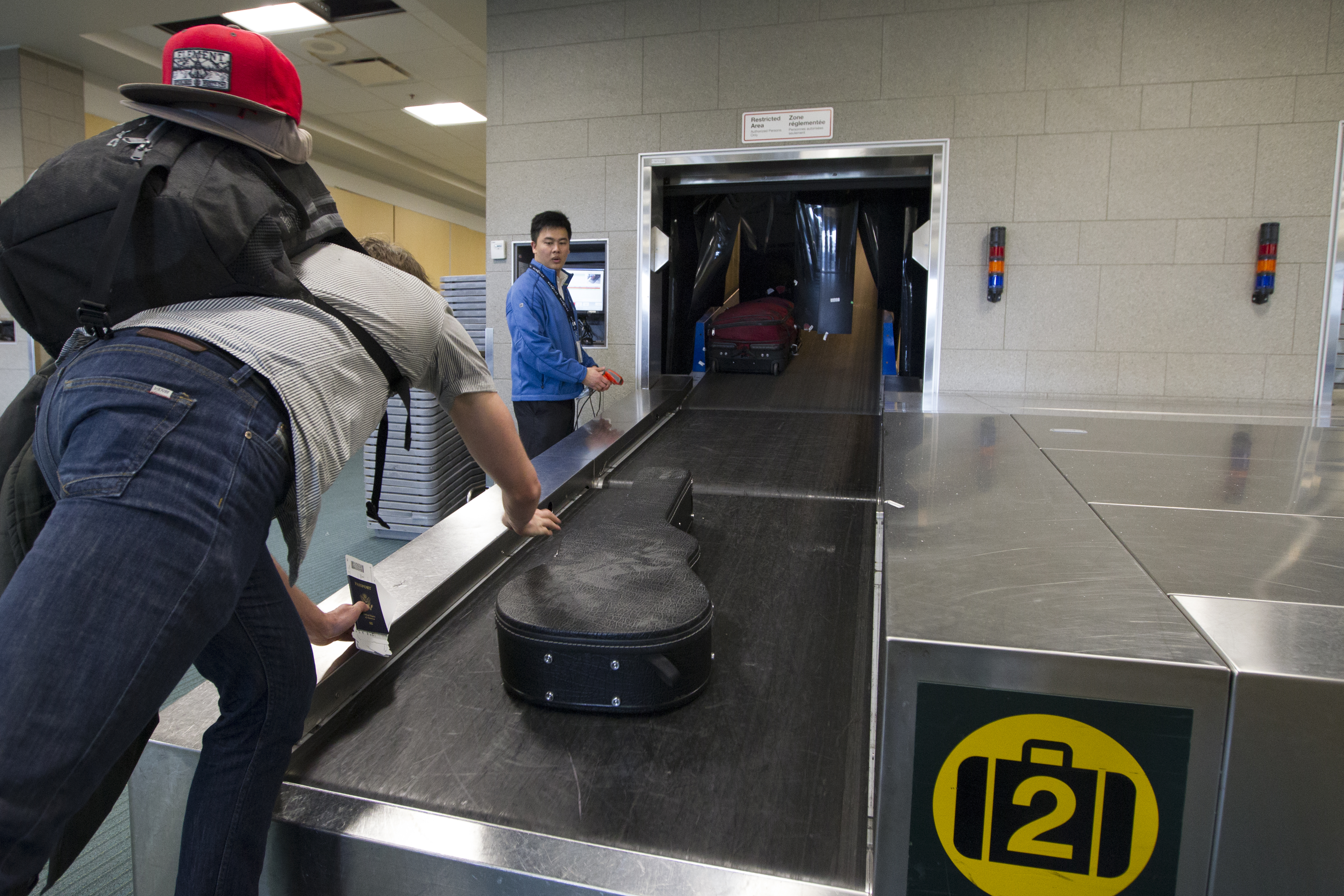 Preclearance travelers drop their checked luggage for secure baggage handling at Vancouver International Airport.Preclearance travelers drop their checked luggage for secure baggage handling at Vancouver International Airport.