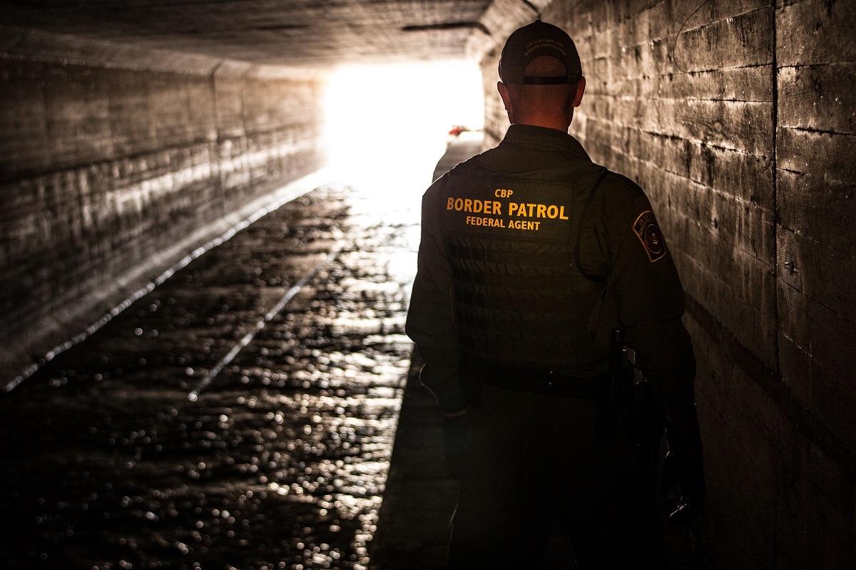 Border Patrol agent inspects a water drainage tunnel that spans from Nogales, Ariz. into Mexcio.