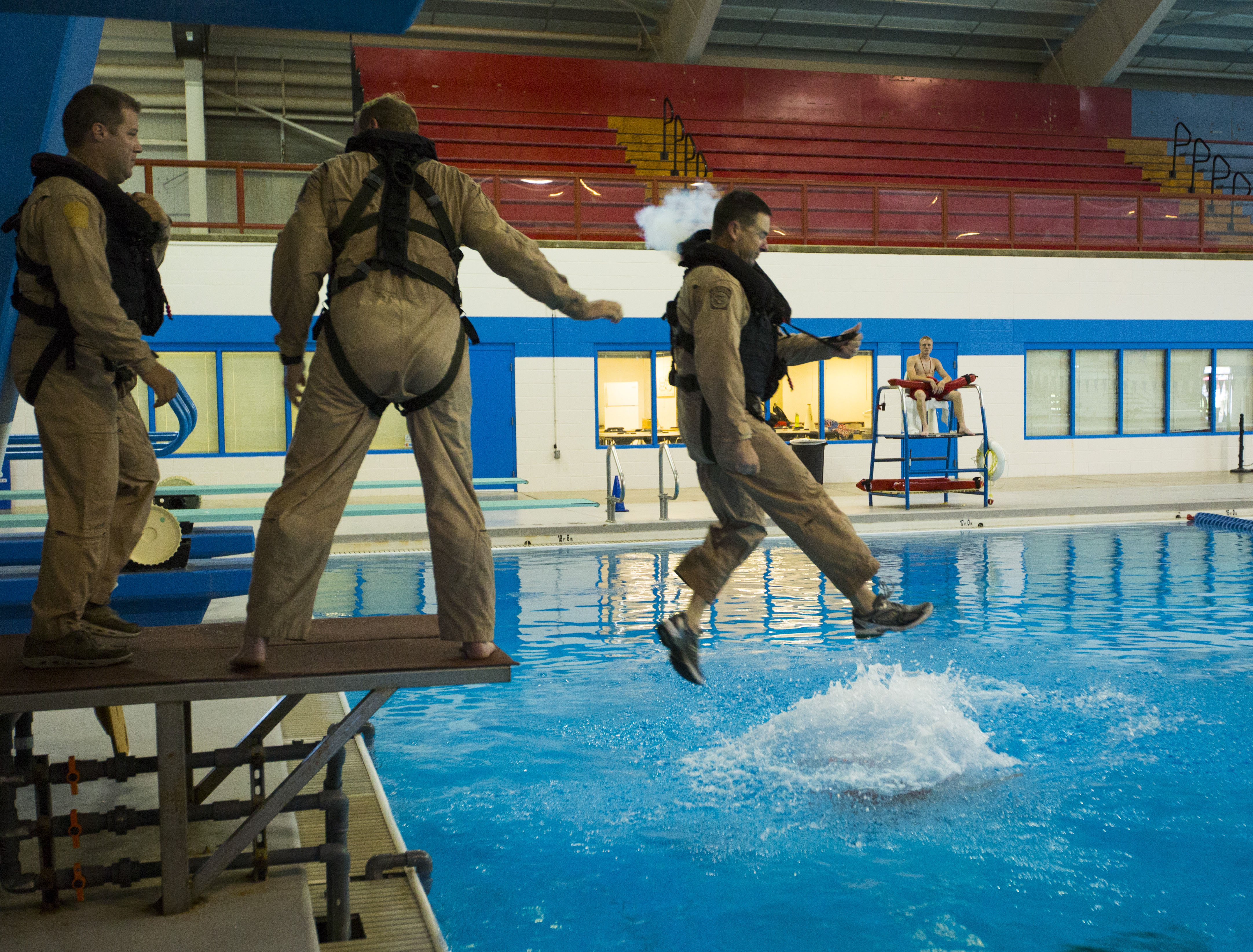 A diving platform is used to simulate an aircraft evacuation.