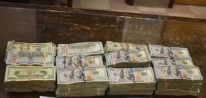Stacks containing $274,867 in unreported currency seized by CBP officers at Brownsville Port of Entry.
