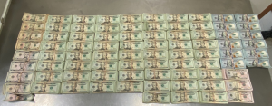 Stacks containing $247,500 in unreported currency seized by CBP officers during an outbound examination at Pharr International Bridge.