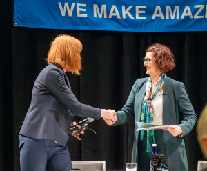 EAC AnnMarie Highsmith shakes hands on stage