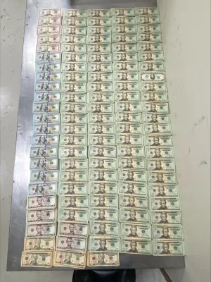 Stacks of bills containing $331,660 in unreported outbound currency seized by CBP officers at Hidalgo International Bridge.