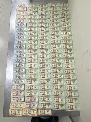 Stacks of bills containing $331,660 in unreported outbound currency seized by CBP officers at Hidalgo International Bridge.