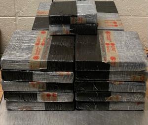Packages containing 49 pounds of cocaine seized by CBP officers at Roma Port of Entry.