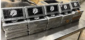 Packages containing 65 pounds of cocaine seized by CBP officers at Laredo Port of Entry.