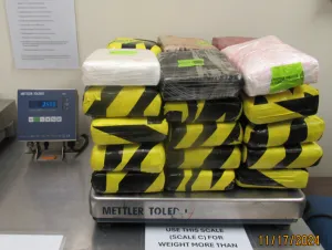 Packages containing 77 pounds of cocaine seized by CBP officers at Hidalgo Port of Entry.