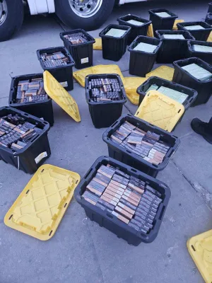 Plastic bins filled with ammunition that were being smuggled to Mexico in the cargo hold of a bus.