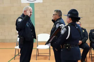 El Paso Director of Field Operations Hector Mancha (left) administers the oath of office to new Presidio Port Director Benito Reyes Jr.