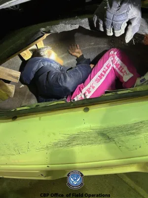 Alien attempting to illegally enter the US found in the vehicle trunk.