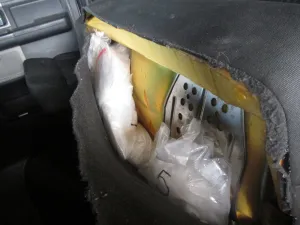 Methamphetamine bundles in vehicle seat.