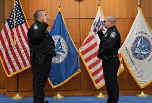 Miguel Garza is sworn in as Area Port Director Charlotte by (Acting) DFO Zachary Thomas.