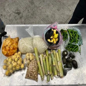 An examination table full of prohibited fruits and vegetables intercepted by CBP agriculture specialists during the busy paisano return weekend.
