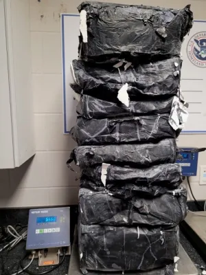 Packages containing 124.78 pounds of methamphetamine seized by CBP officers at Del Rio Port of Entry.