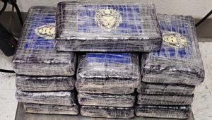 Packages containing 32.76 pounds of cocaine seized by CBP officers at Eagle Pass Port of Entry.
