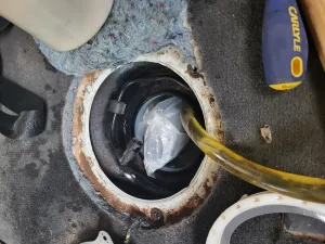 Drug bundle inside fuel tank.