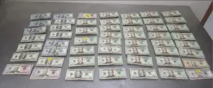 Stacks containing $185,785 in unreported currency seized by CBP officers at Hidalgo Port of Entry.