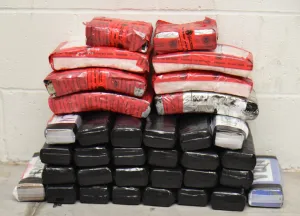 Packages containing 54 pounds of cocaine seized by CBP officers at Laredo Port of Entry.