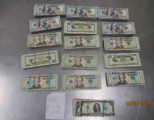 Stacks containing $65,948 in unreported currency seized by CBP officers at Pharr International Bridge.