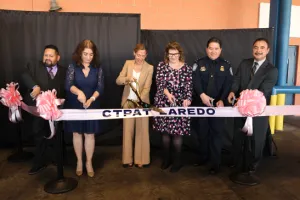 Acting Executive Assistant Commissioner Diane Sabatino, CBP Office of Field Operations, flanked by CBP HQ and Laredo mgmt. officials, cuts the ribbon to formally open the CTPAT Laredo Field Office.