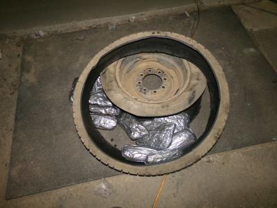 CBP officers at the Otay Mesa Port of Entry inspect the tires of a pick-up truck presenting for inspection to discover concealed packages of methamphetamine.