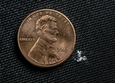 This image shows how a few grains of fentanyl – just 2 milligrams – can be a lethal dose. Photo courtesy of U.S. Drug Enforcement Administration