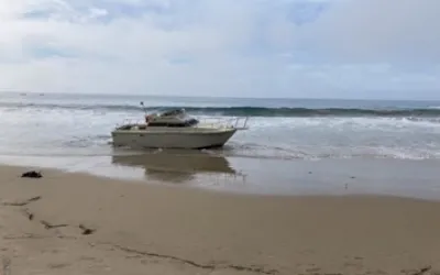 Beached pleasure craft vessel 