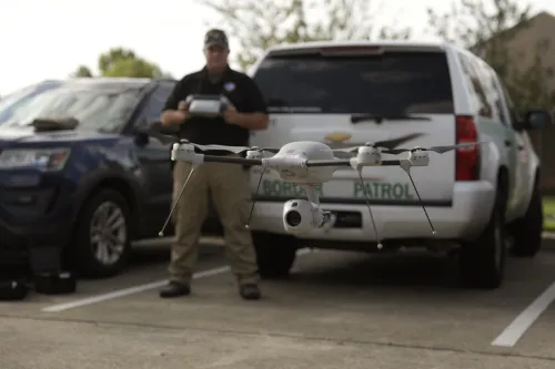 A Border Patrol agent prepares a drone to help recovery efforts in the wake of a natural disaster.