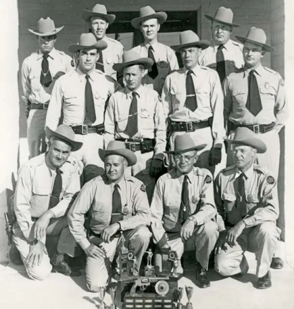 The 1954 Yuma Sector Border Patrol champion pistol shooting team.