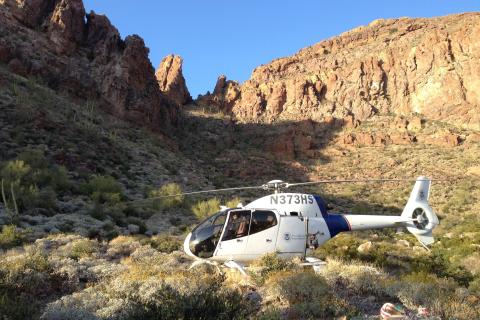 An Air and Marine Operations EC120 crew lands in the desert to retrieve bundles of marijuana near Yuma, Arizona.