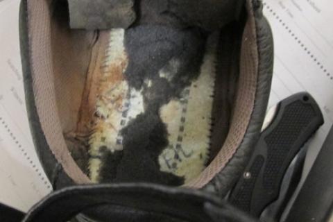 CBP officers locate heroin within the soles of a smuggler's shoes