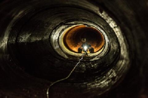 A CBP robot is deployed in a drainage pipe