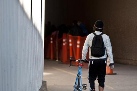 Bicyclist prepares to enter the dedicated SENTRI lane for frequent crossers at San Ysidro, Calif. port of entry.