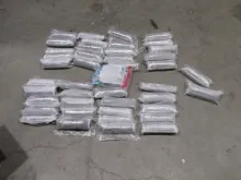 Packages of fentanyl that was found in the gas tank of a vehicle.