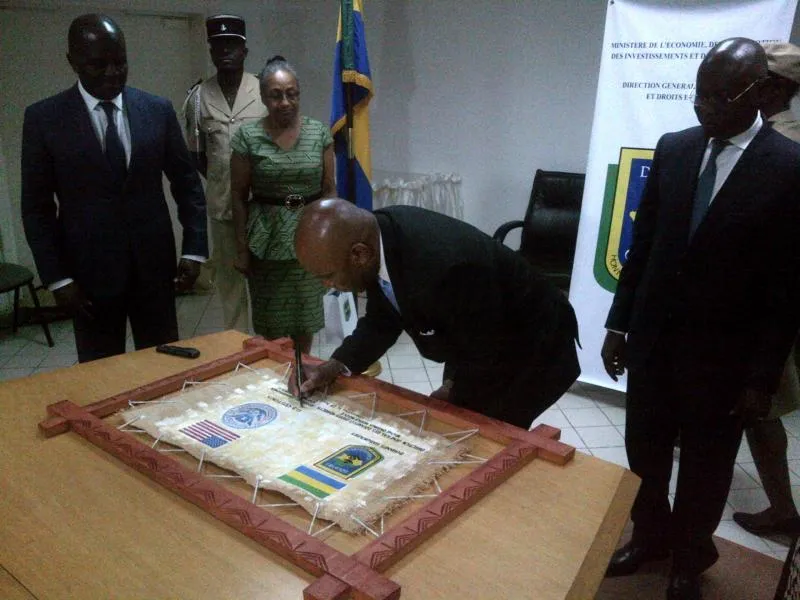 Standing from left, Gabon Economy and Finance Minister Regis Immongault, U.S. Ambassador Cynthia Akuetteh, Assistant Commissioner Charles Stallworth II, and Customs and Indirect Duties Director General Michel Ondinga Ngouengoue