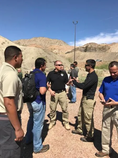 Attaché Michael Vargas (second from right) and Mark Bazill, CBP’s Latin America and Caribbean Division director (third from right), brief Panamanian Immigration and Border Police officers on U.S. Border Patrol Operations at the border in El Paso Sector. Photo courtesy of Michael Vargas
