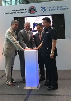 Photo of Commissioner Kerlikowske with dignitaries in Singapore